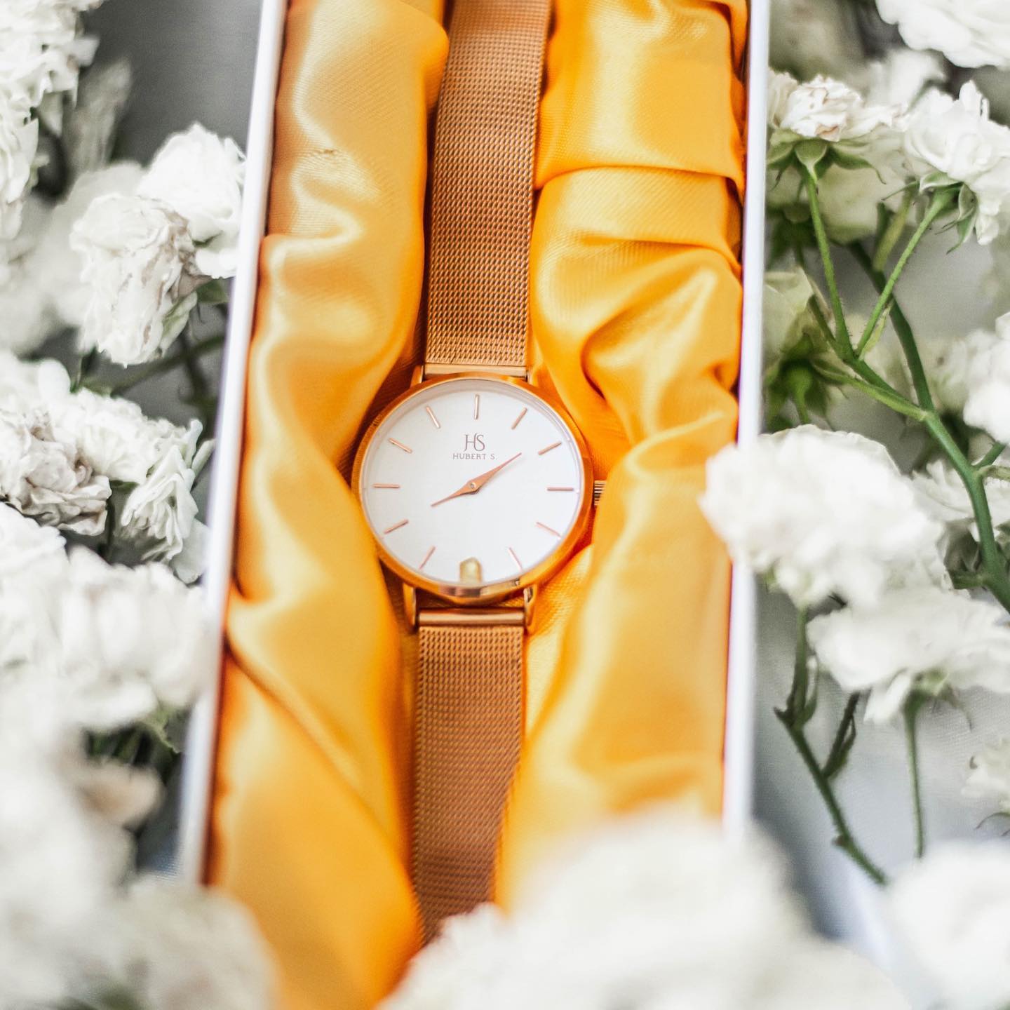 Hubert S. rose gold watch worn on the wrist